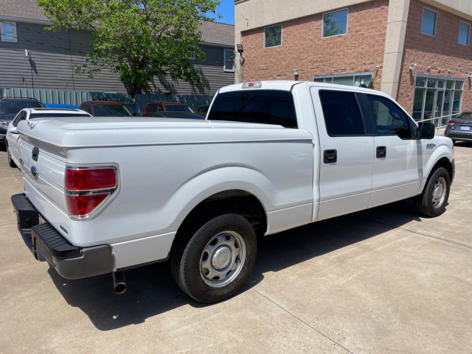 2013 White /Gray Ford F-150 XL (1FTFW1CF1DK) with an 5.0L V8 engine, 6-Speed Automatic transmission, located at 1501 West 15th St., Houston, 77008, (713) 869-2925, 29.797941, -95.411789 - Photo #2